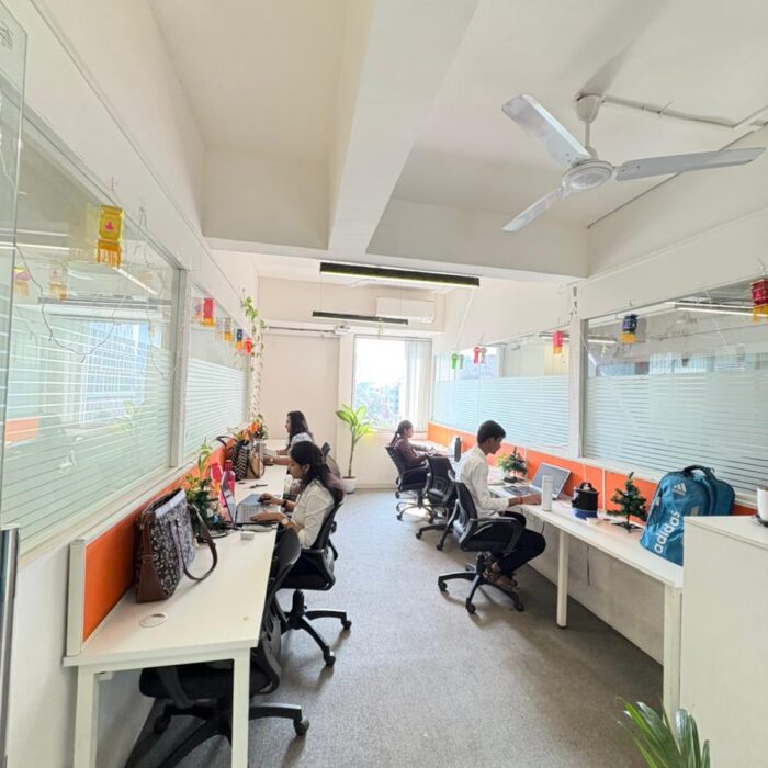 Modern Indian coworking space with professionals collaborating